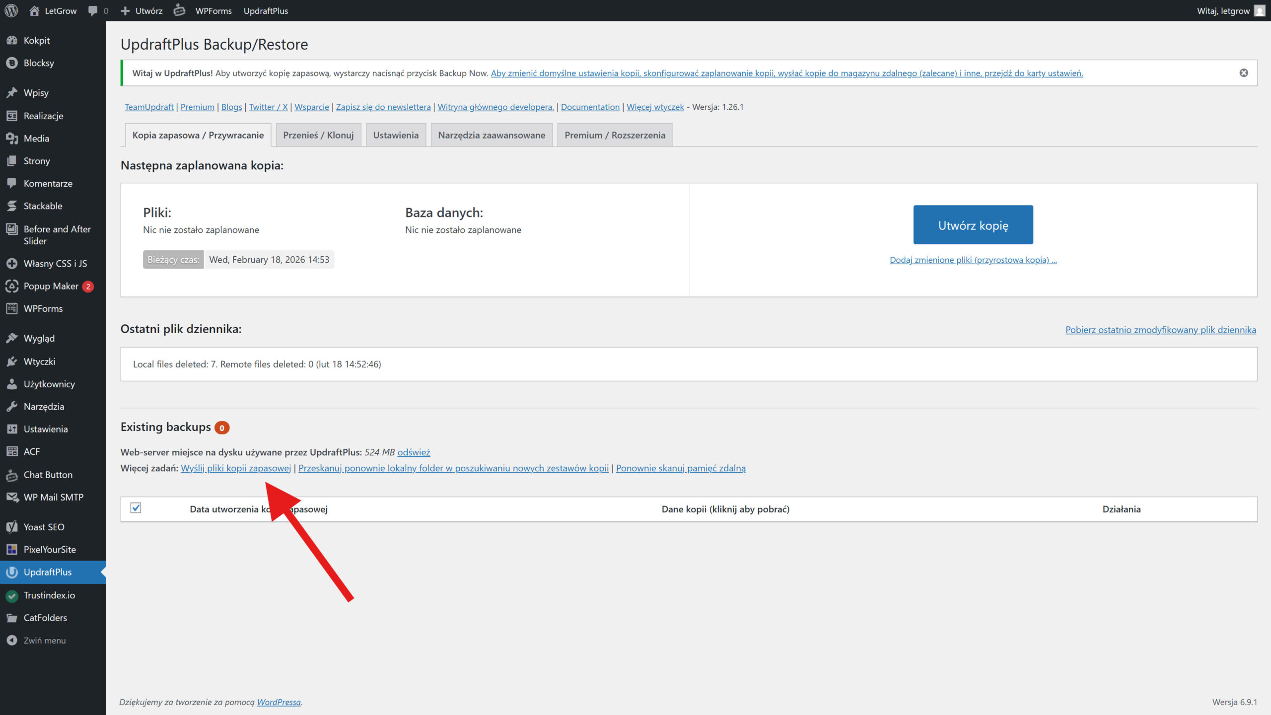 Zrzut ekranu z wtyczki UpdraftPlus pokazujący jak wgrać pliki kopii zapasowej